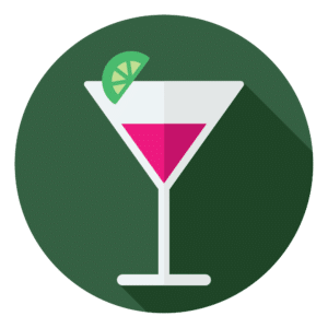 A martini in a glass with a lime slice.