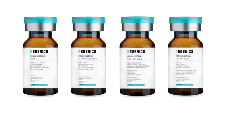 Four bottles of vitamin skin care products on a white background.